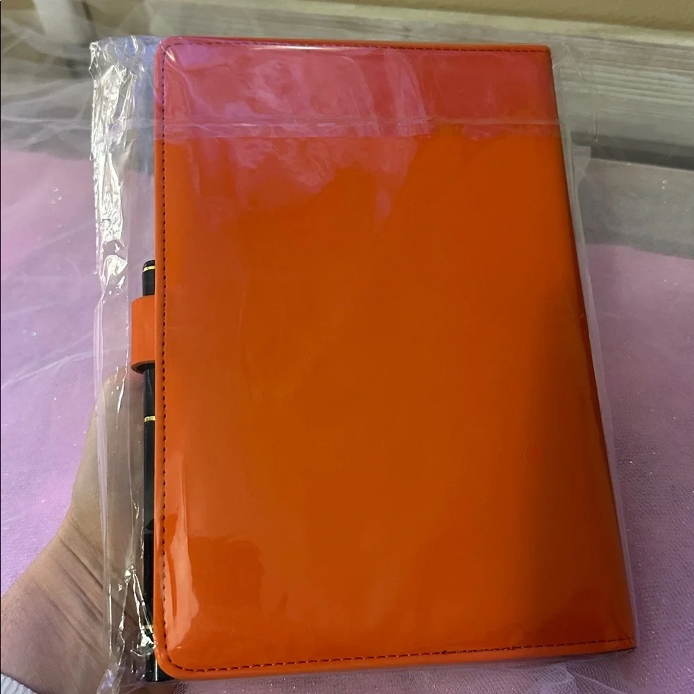 Hermès Orange Leather Notebook Cover